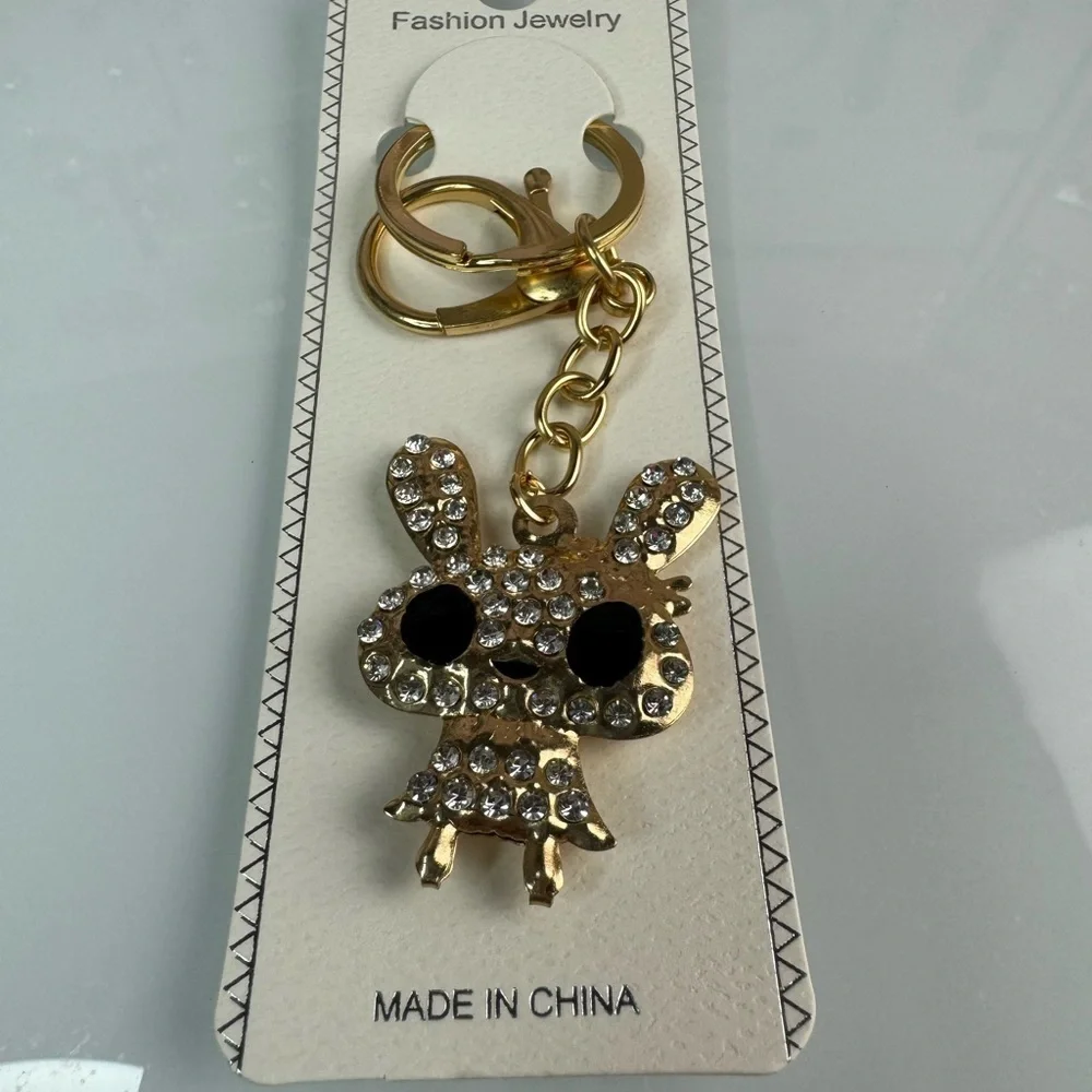 ‼️5/$25‼️ Fashion Jewelry Gold and Black Keychain